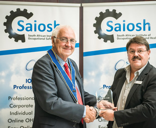 Robin Jones (left) is inducted into the Saiosh Wall of Fame by Saiosh CEO Neels Nortjé.